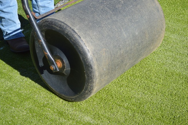 Metro New York artificial grass installation - top layer rolled